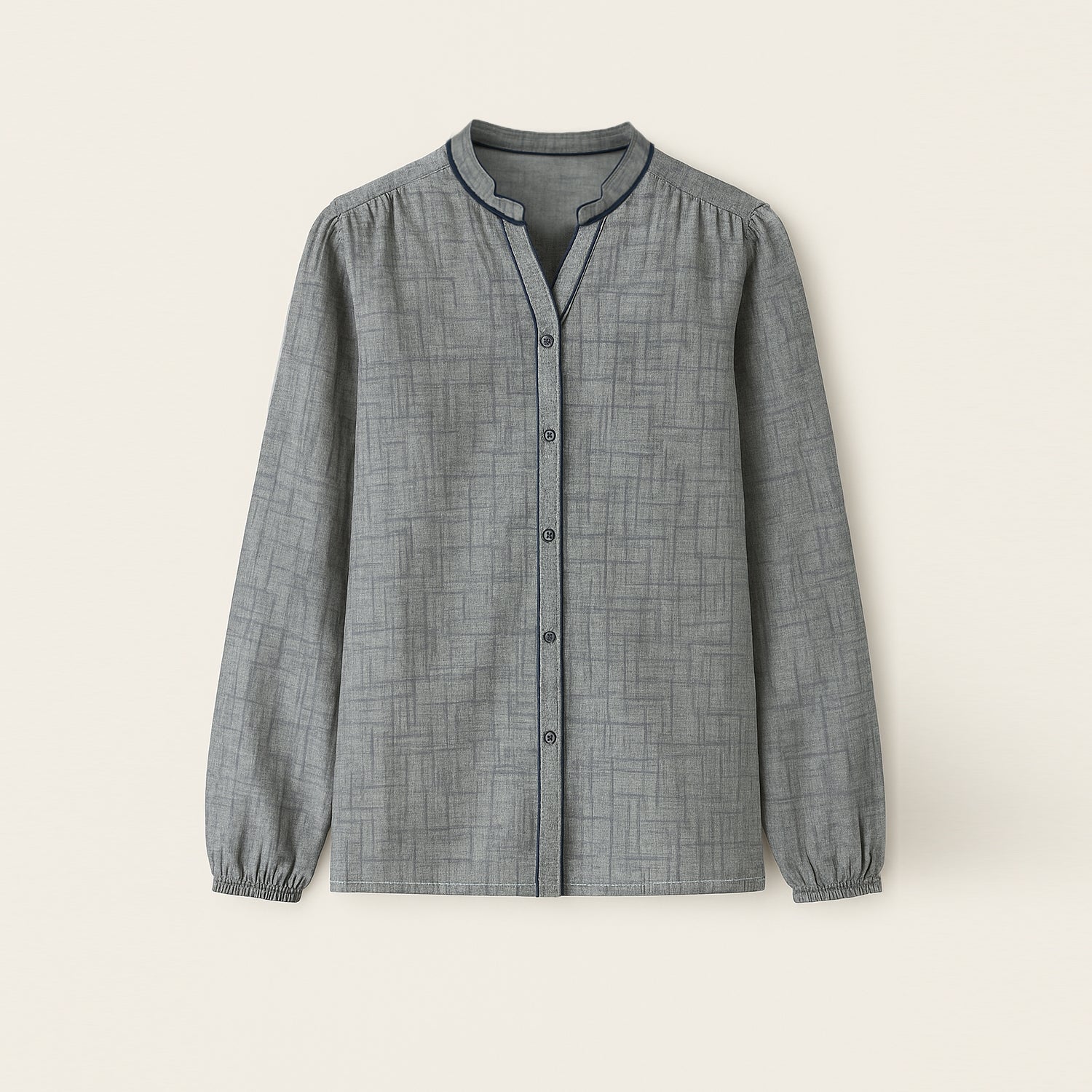 Grey casual men's shirt with long sleeves, button-up front, and subtle geometric pattern
