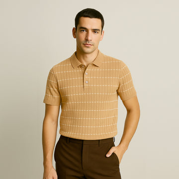 Man wearing a beige check-patterned knitted polo shirt and brown pants, neutral background