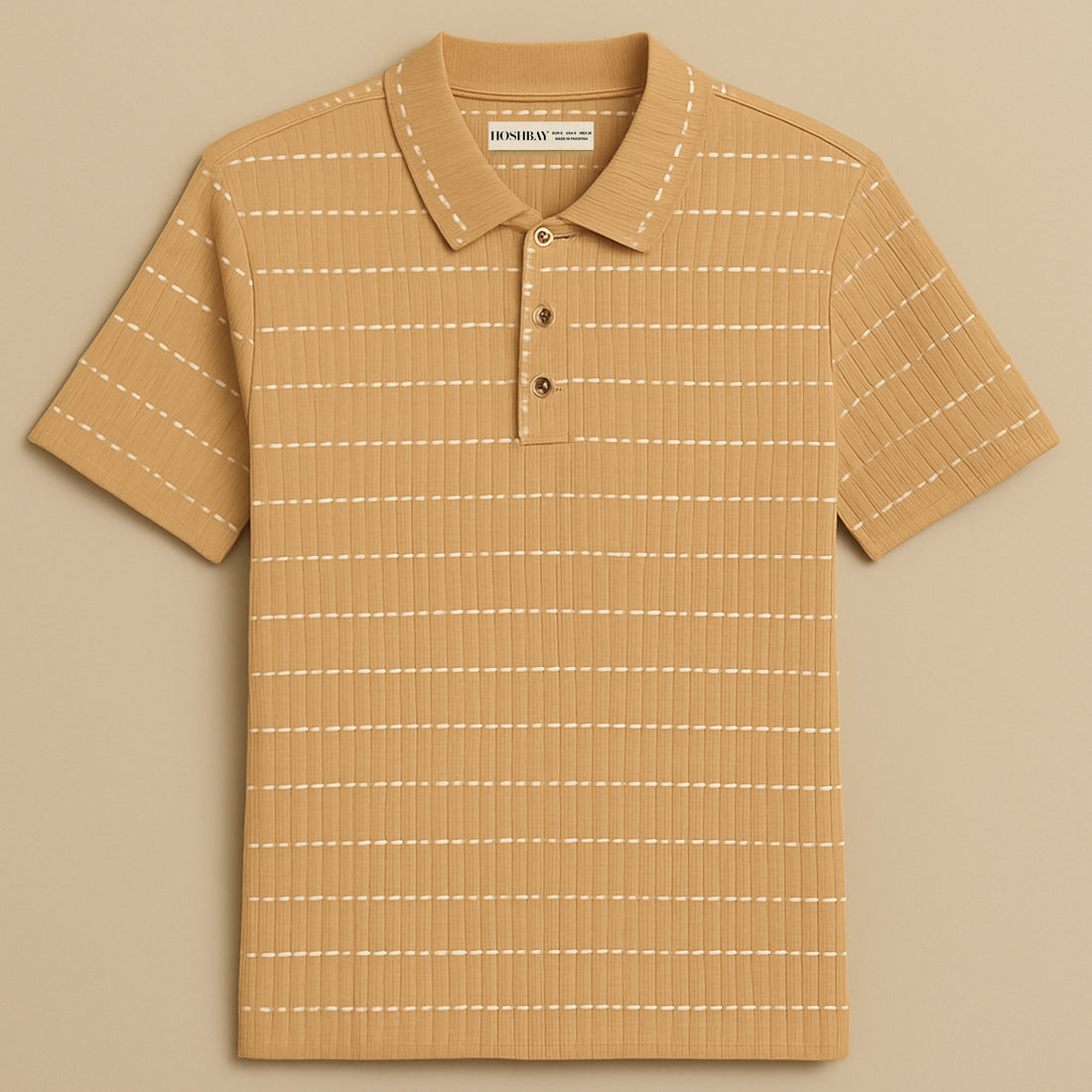 Man wearing a beige check-patterned knitted polo shirt and brown pants, neutral background