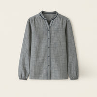 Grey casual men's shirt with long sleeves, button-up front, and subtle geometric pattern