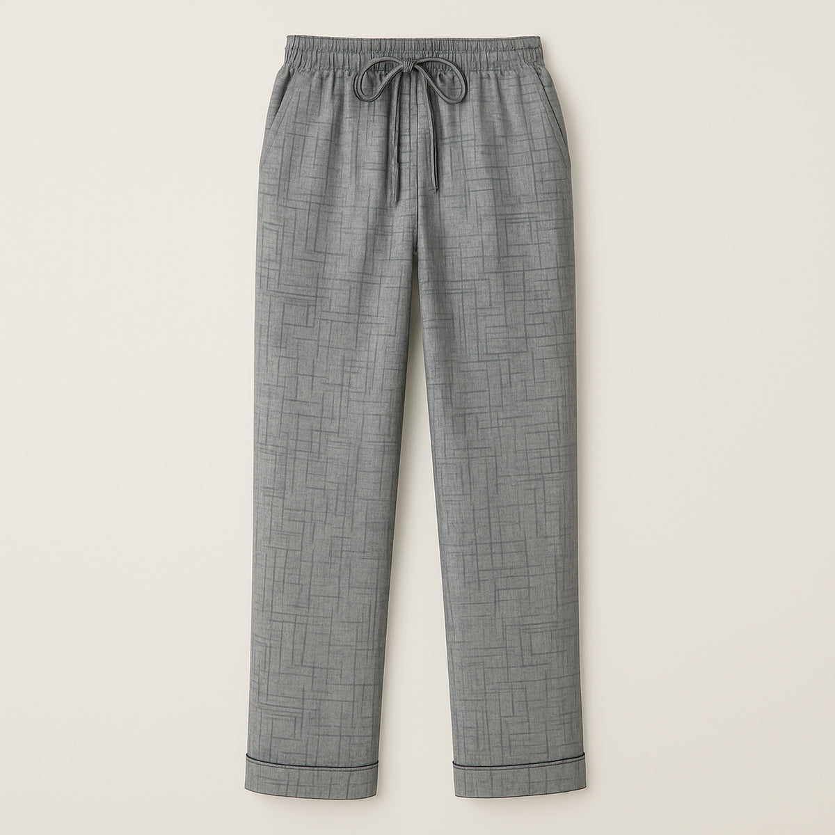Grey drawstring men’s lounge pants with subtle geometric pattern and cuffed hems