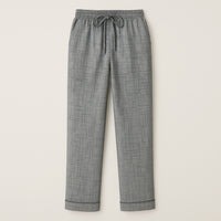Grey drawstring men’s lounge pants with subtle geometric pattern and cuffed hems