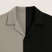 Two-tone men's shirt with beige and black color block, spread collar, and button detail