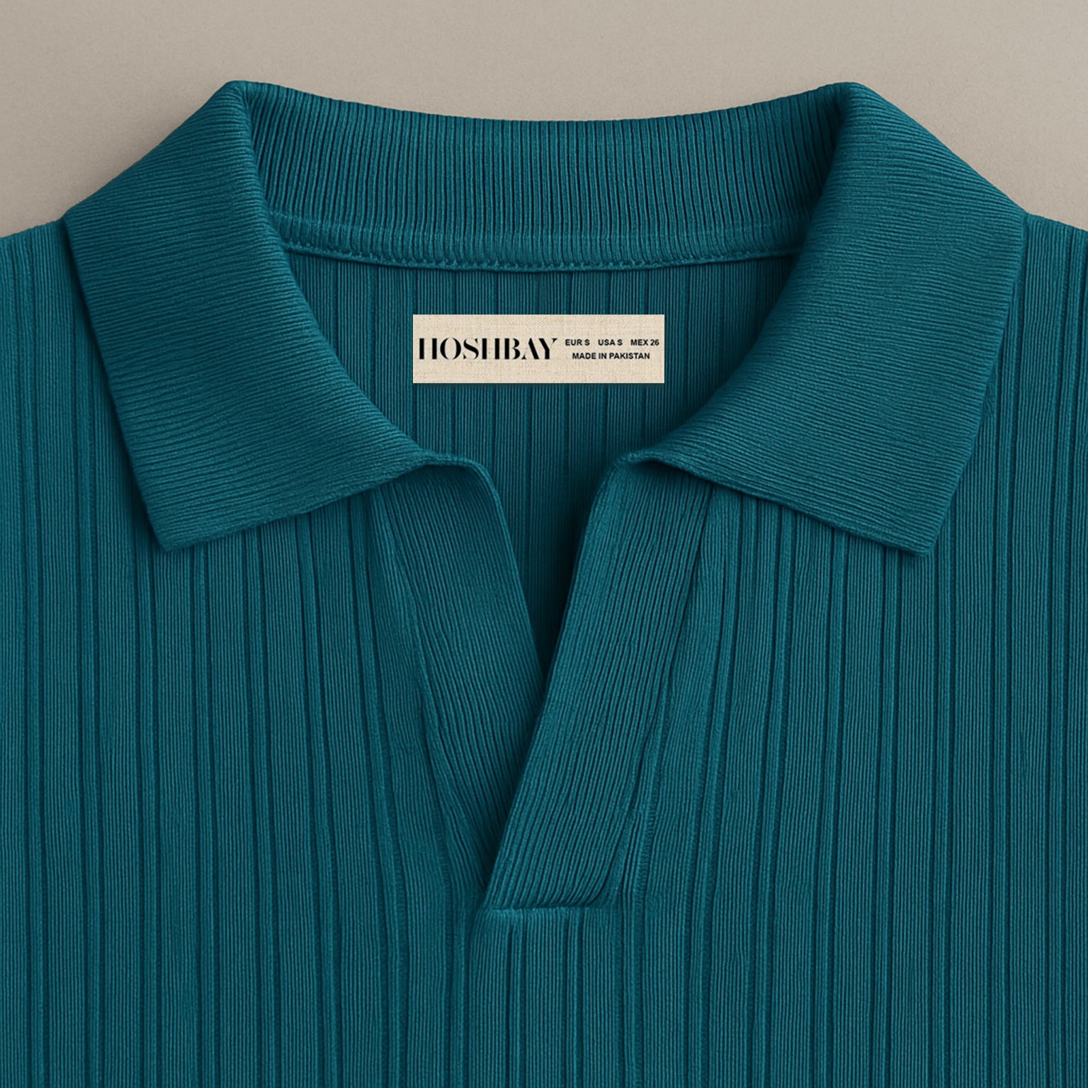 Teal ribbed polo shirt with collar and V-neck, modern textured men's fashion top